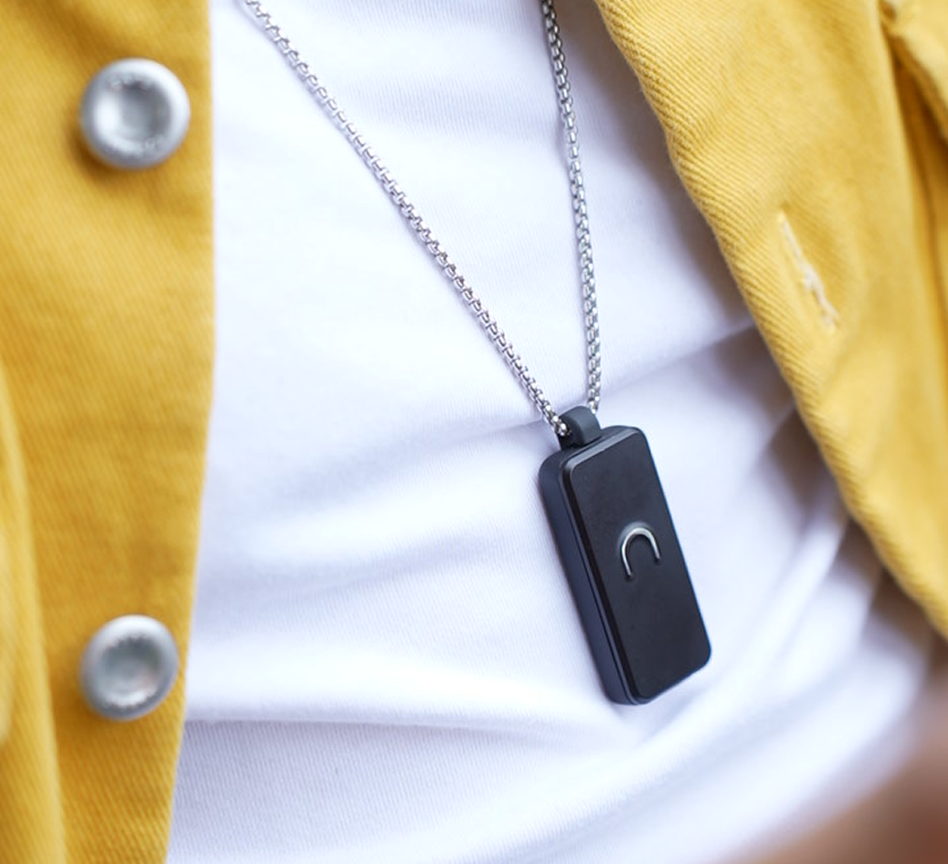 Neo 1 pendant worn on a necklace